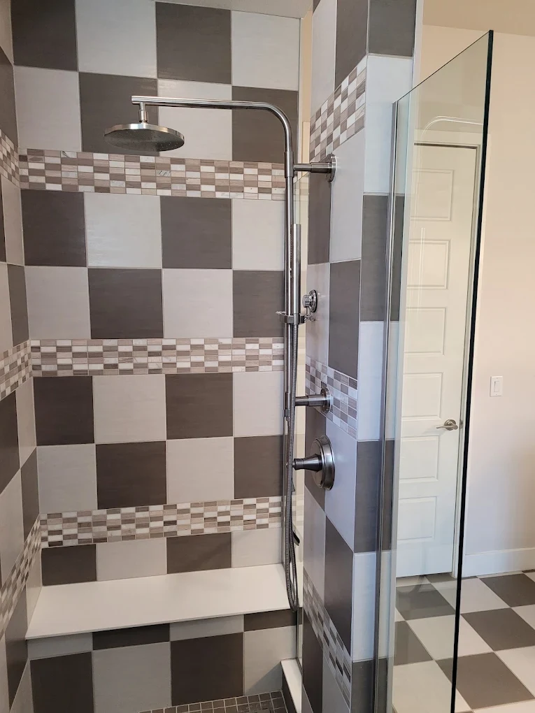 Custom walk-in shower with rain head and thermostatic valve